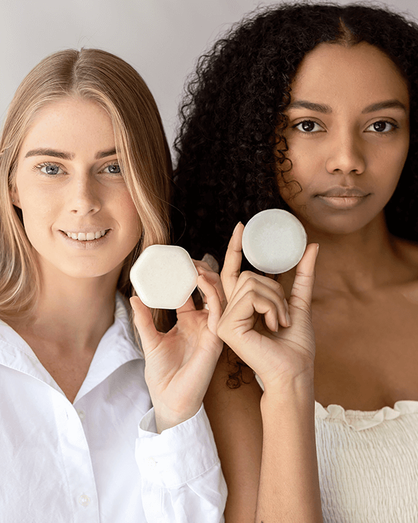 Bree Probiotic Shampoo bar models holding shampoo bars