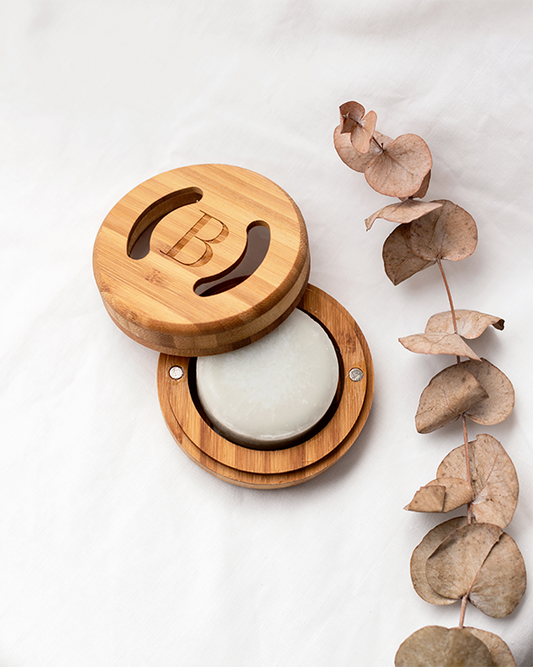 Bree Probiotic Jojoba Conditioner Bar In wooden soap dish